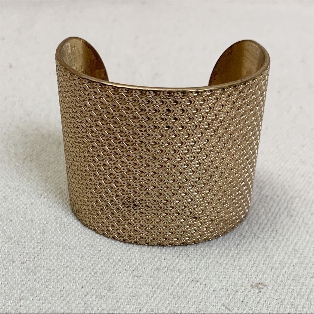 Lacoste Wide Gold tone Cuff bracelet